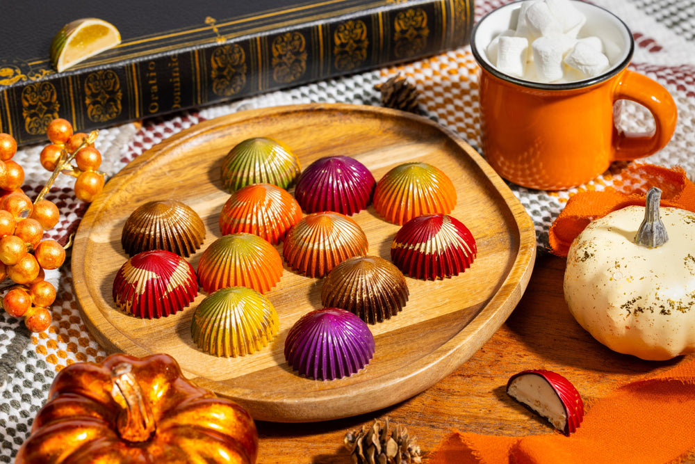 Open Autumn Bliss 12-piece box displaying handcrafted gourmet chocolates.