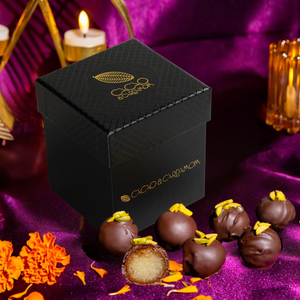 Chocolate Covered Gulab Jamun 12-piece gift box featuring handcrafted artisan chocolates inspired by the classic Indian dessert.