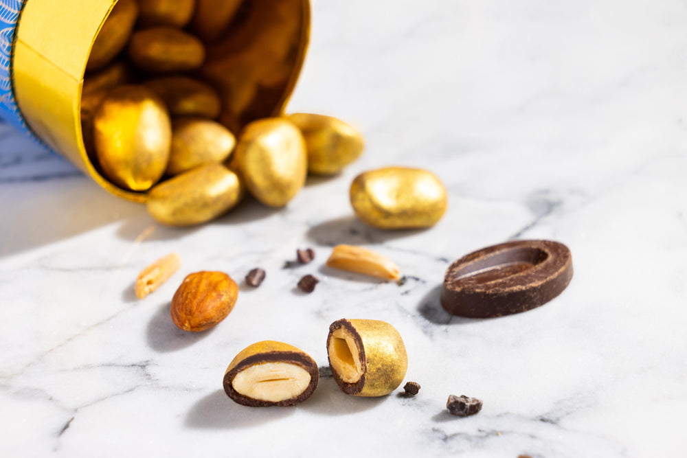 Open Dark Chocolate Almond dragees displaying premium chocolate-coated almonds.