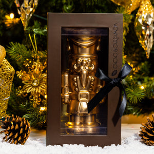 Front view of the Dark Chocolate Gourmet Nutcracker showcasing handcrafted dark chocolate details.