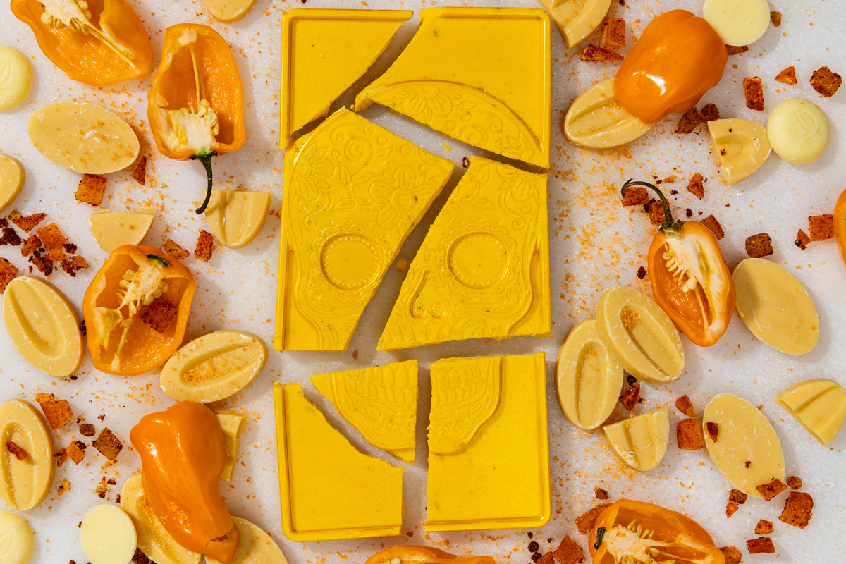 Unwrapped Mango Habanero artisan chocolate bar displaying handcrafted gourmet chocolate.