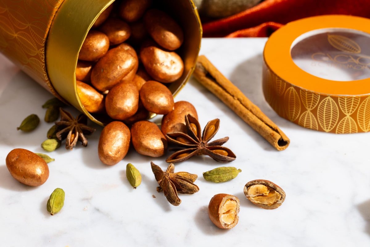Open Pumpkin Spice Almond Dragees displaying premium chocolate-coated almonds.