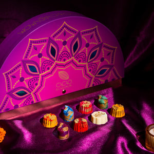 Rangoli Gift Box 14-piece artisan chocolate assortment elegantly arranged for Diwali gifting and festive celebrations.