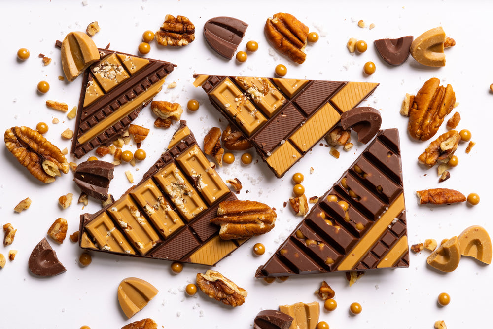 Unwrapped Texas Pecan Artisan Bar displaying handcrafted gourmet chocolate.
