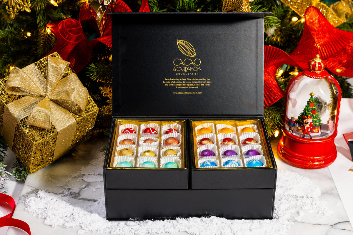 The Holiday Treasure Box 48-piece featuring handcrafted artisan chocolates in a luxury Christmas gift box by Cacao & Cardamom.
