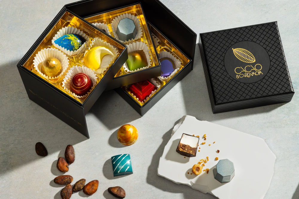 Close-up of handcrafted chocolates from the Three Tier Dozen Classic 12-piece collection.