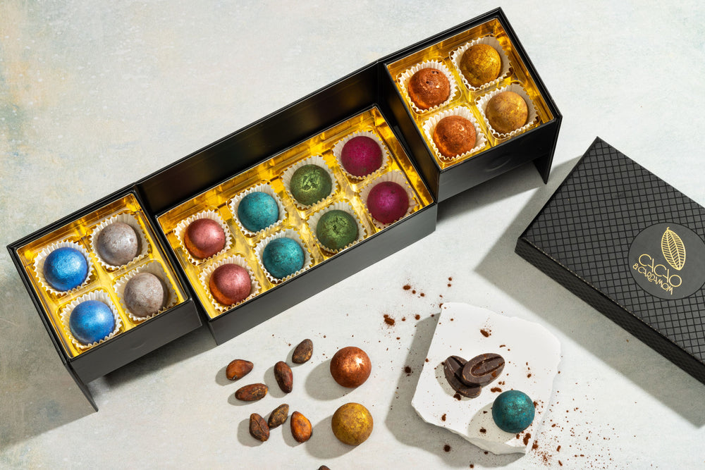 Open Vegan Truffle Collection displaying handcrafted dairy-free artisan truffles.