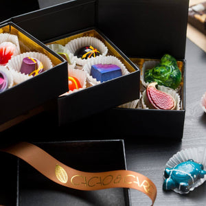 Three Tier Dozen Signature Collection 12-piece artisan chocolates beautifully presented for luxury gifting.